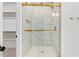 Modern bathroom with a glass shower door and stylish fixtures at 9235 Bear Run Ln, Middlesex, NC 27557