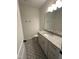 Elegant bathroom with granite countertops, custom cabinets, and decorative tile flooring, showcasing stylish design at 9235 Bear Run Ln, Middlesex, NC 27557