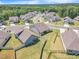 Aerial shot of a well-maintained neighborhood with spacious backyards and inviting homes at 1 Parker Pond Ct, Durham, NC 27703