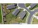 An aerial view of homes with well-maintained green lawns, creating a serene and inviting neighborhood setting at 1 Parker Pond Ct, Durham, NC 27703