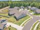 An aerial view showing the community with well-maintained lawns, sidewalks, and landscaping in a suburban neighborhood at 1 Parker Pond Ct, Durham, NC 27703