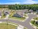 Spacious green lawns surround well-maintained homes in a quiet neighborhood from this high-angle street view at 1 Parker Pond Ct, Durham, NC 27703