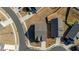 Bird's eye view of the houses and surrounding paved streets at 1 Parker Pond Ct, Durham, NC 27703