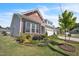 Well-maintained home featuring a colorful flower bed and tasteful landscaping at 1 Parker Pond Ct, Durham, NC 27703