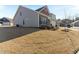 Well-maintained lawn and landscaping complement this inviting home exterior at 1 Parker Pond Ct, Durham, NC 27703