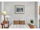 Cozy living room area featuring neutral tones, decorative pillows, and a framed picture at 1 Parker Pond Ct, Durham, NC 27703