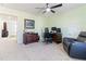 Office area with desk, chair, computer, and comfortable seating area at 1 Parker Pond Ct, Durham, NC 27703