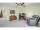Comfortable home office features desk, chair, and a relaxing reading chair at 1 Parker Pond Ct, Durham, NC 27703