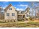Charming two-story home with stone accents, inviting front porch and well-manicured lawn at 10 Holden Ct, Youngsville, NC 27596