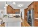 Modern kitchen with stainless steel appliances, sleek countertops, and ample cabinet space for culinary enthusiasts at 10 Holden Ct, Youngsville, NC 27596