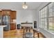 Cozy kitchen nook with a round table, stools, and a large window, perfect for casual dining and enjoying natural light at 10 Holden Ct, Youngsville, NC 27596