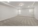 Spacious bedroom featuring neutral walls, plush carpeting and recessed lighting for a serene feel at 1103 Freestone Rd, Durham, NC 27703