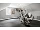 Spacious exercise room with rubber flooring and a large multi-station workout machine at 112 Hartland Ct, Raleigh, NC 27614