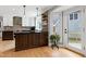 Updated kitchen with custom island, modern appliances, and ample cabinet space at 112 Hartland Ct, Raleigh, NC 27614