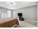 Spacious main bedroom featuring a large bed, modern dresser, and a flat screen television at 112 Hartland Ct, Raleigh, NC 27614