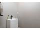 Compact powder room with a modern floating sink and stylish fixtures at 112 Hartland Ct, Raleigh, NC 27614