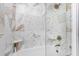 Beautifully designed shower features glass doors and marble tile surround at 112 Hartland Ct, Raleigh, NC 27614
