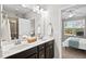 Bathroom with double sink vanity, soaking tub and shower at 114 Mt Evans Dr, Durham, NC 27705