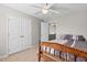 Bedroom with wood-frame bed, and closet at 114 Mt Evans Dr, Durham, NC 27705