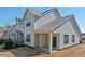 Exterior shot showing a home's siding, back patio and yard space at 114 Mt Evans Dr, Durham, NC 27705