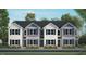 New construction townhomes boast modern exteriors with classic design elements and manicured landscaping at 123 Holmes Corner Dr, Smithfield, NC 27577