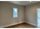 Neutral bedroom with window providing natural light and views, offering a calm and inviting space at 12912 Grey Willow Dr, Raleigh, NC 27613