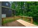 Wooden deck offers a relaxing space with wooded views at 12912 Grey Willow Dr, Raleigh, NC 27613