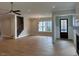 Spacious living room with hardwood floors, staircase, and natural light at 12912 Grey Willow Dr, Raleigh, NC 27613