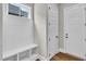 Mudroom with built-in bench and storage at 12912 Grey Willow Dr, Raleigh, NC 27613