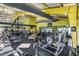 Spacious gym featuring an array of weight machines, cardio equipment, and ample workout space at 173 E Wilson St, Clayton, NC 27520