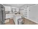 Open kitchen offers an island, stainless steel appliances, and plenty of storage space at 173 E Wilson St, Clayton, NC 27520