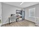 Bright office space featuring modern desk, shelves, and natural light at 173 E Wilson St, Clayton, NC 27520