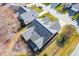 An aerial shot showcasing the home's roof and landscaping, providing a bird's-eye view of the property at 2 Poplar Ave, Elon, NC 27244