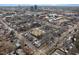 A scenic aerial view captures the city skyline and this neighborhood and homes within at 201 W Trinity Ave, Durham, NC 27701