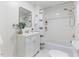 Modern bathroom features vanity, toilet, shower, and bright tile flooring at 201 W Trinity Ave, Durham, NC 27701