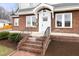 Close up of the brick steps leading to the front door at 201 W Trinity Ave, Durham, NC 27701