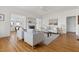 Spacious living area showcasing hardwood floors and a decorative fireplace at 201 W Trinity Ave, Durham, NC 27701