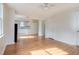 Spacious living room with hardwood floors and natural light throughout at 201 W Trinity Ave, Durham, NC 27701