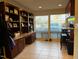 Kitchenette with built-in desk, granite counters, and view of neighborhood at 203 Oak Tree Dr, Chapel Hill, NC 27517