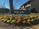 The Oaks Condominiums sign with flowerbed at 203 Oak Tree Dr, Chapel Hill, NC 27517