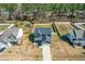 Aerial view of a home with a spacious backyard in a quiet neighborhood at 238 Ashpole Trail Trl, Clayton, NC 27520