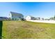 Large backyard showing ample space between homes, complemented by a white privacy fence at 238 Ashpole Trail Trl, Clayton, NC 27520