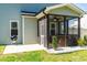 Exterior view of home featuring a screened in back porch, patio, and yard at 238 Ashpole Trail Trl, Clayton, NC 27520