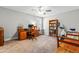 Comfortable office space with wood desk and bookshelves providing ample room for work and study at 238 Ashpole Trail Trl, Clayton, NC 27520