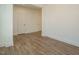 Spacious bedroom with wood-look floors and white walls, offering a blank canvas at 267 Parkland Dr Dr, Pittsboro, NC 27312