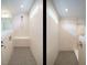 Modern walk-in shower features a glass enclosure, bench, and niche at 267 Parkland Dr Dr, Pittsboro, NC 27312