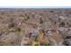Aerial view of a home in a serene neighborhood surrounded by lush greenery at 301 Hillsborough St, Chapel Hill, NC 27514