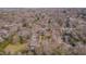 Aerial view of a charming home nestled among lush trees in a quiet neighborhood at 301 Hillsborough St, Chapel Hill, NC 27514