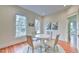 Bright dining room features hardwood floors and natural light at 301 Hillsborough St, Chapel Hill, NC 27514