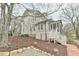 Exterior view of home featuring screened in porch and beautiful landscaping at 301 Hillsborough St, Chapel Hill, NC 27514
